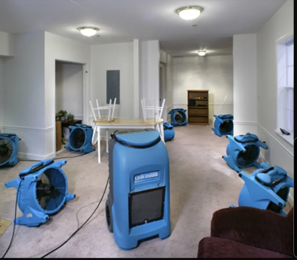 Air movers and dehumidifier setup for Water Damage Restoration in Hudsonville